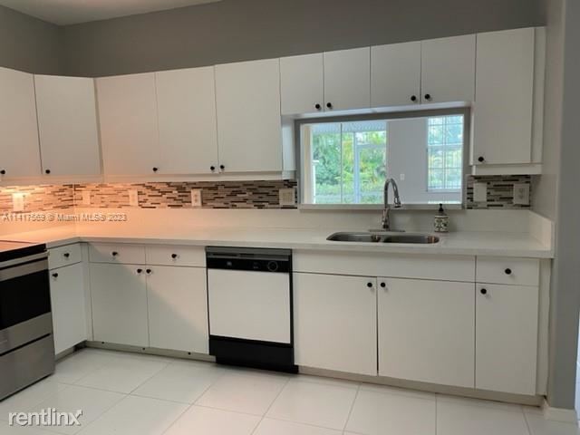 Foto del edificio - 3 br, 2.5 bath House - 9664 Royal Palm Blv...