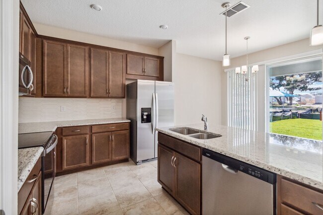 Building Photo - Beautiful New Energy Efficient 4/2 Close t...