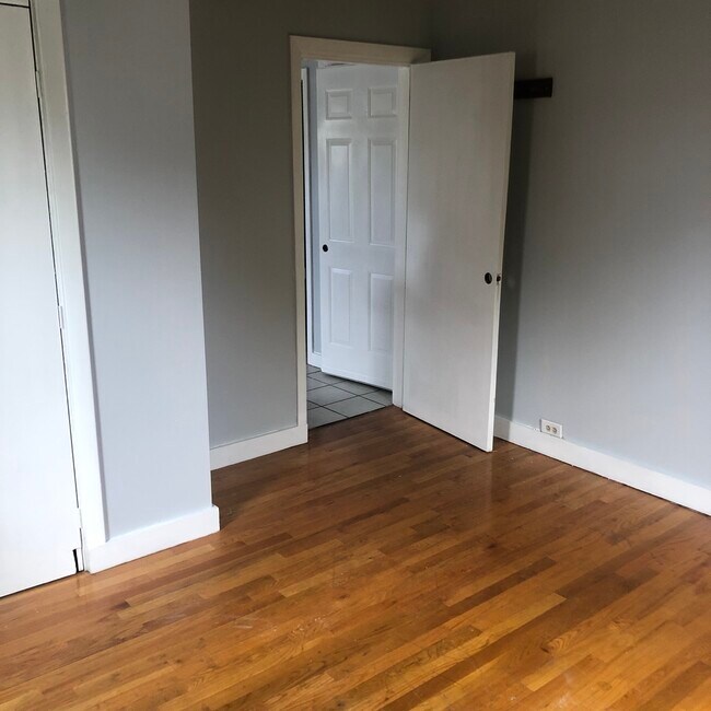 Bedroom with hardwood floor - 203 6th St