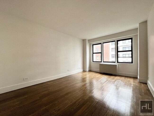 Building Photo - EAST 63 STREET / Spacious Sunlit 1-Bed 1-B...