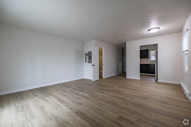 2BR, 1.5BA - Living Room/Kitchen - Newly Renovated Apartments