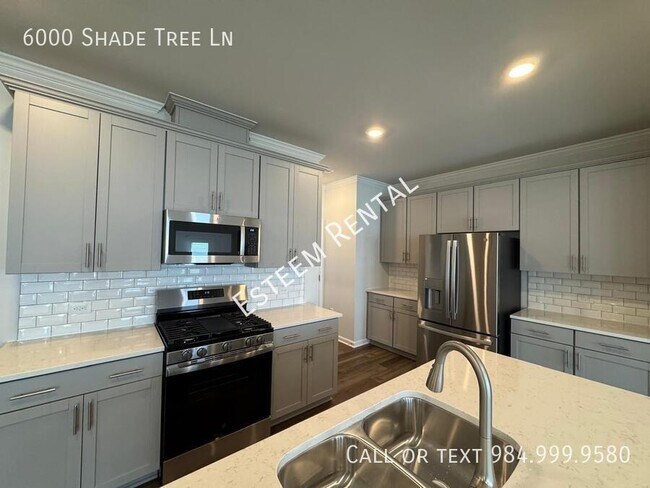 Building Photo - 6000 Shade Tree Ln