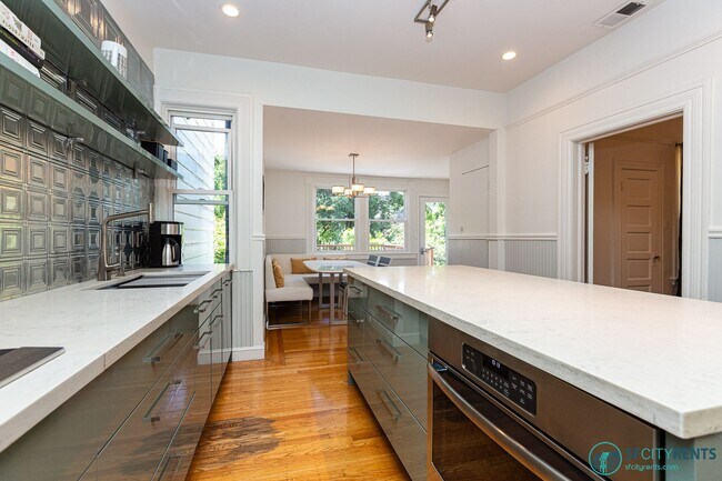 Building Photo - Castro: UNFURNISHED Top Floor Flat w/ Private Deck, W/D in unit & Garage Parking