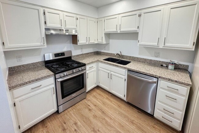 Building Photo - Luxury Scottsdale Condo: Modern Comfort in...
