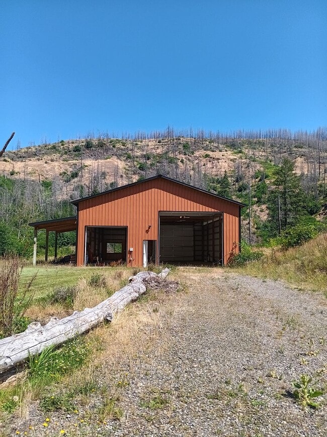Building Photo - Beautiful Chalet Style Riverfront Property...