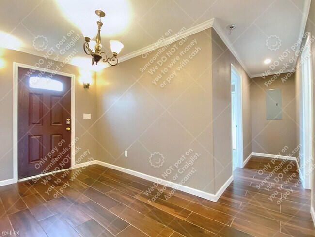 Building Photo - 3 br, 2 bath House - 1002 SW 39th St
