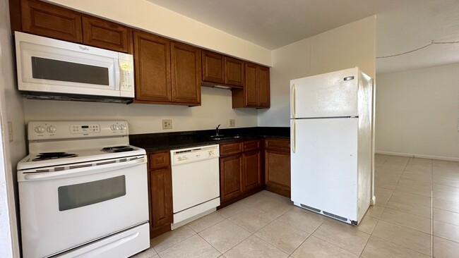 Building Photo - 1651 W Oak Ridge Rd Unit A Orlando, FL 32809