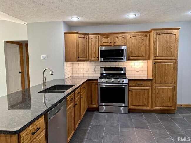 Building Photo - 1209 W Aspen Ct