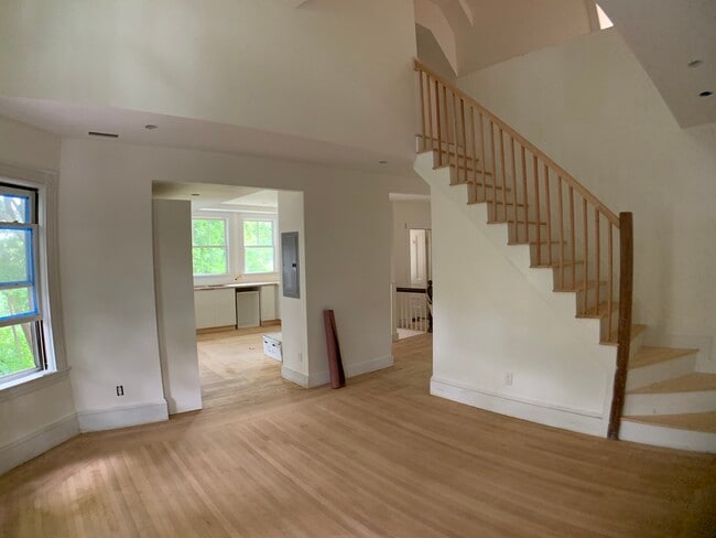 Living area/kitchen and stairs to level 2 - 48 Maple St
