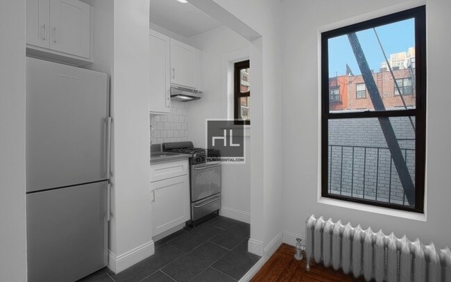 Foto del edificio - 213 W 13th St