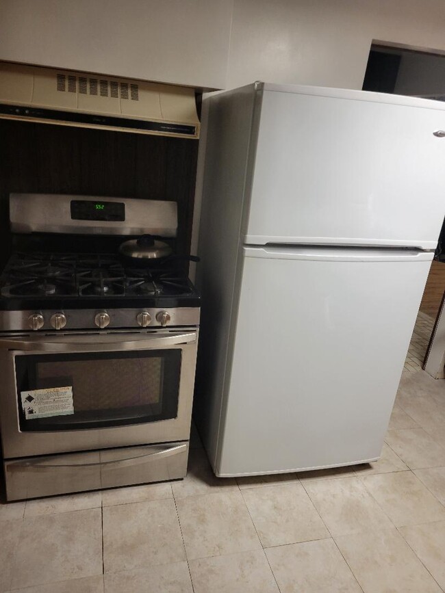 stove and fridge - 237 Lackawanna Ave