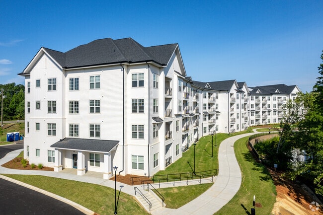 Building Photo - Inspire Royal Park - 55+ Active Adult Community