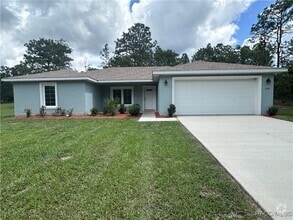Building Photo - 7779 N Triana Dr