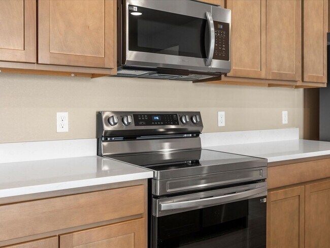 Foto del edificio - Modern 2-Bedroom Condo with Private Patio & Garage in Denver’s Gateway Corridor