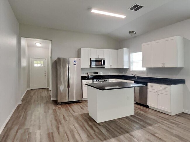 Foto del edificio - 6733 River Ridge Ln