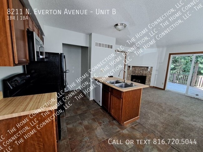 Building Photo - 8211 N Everton Ave