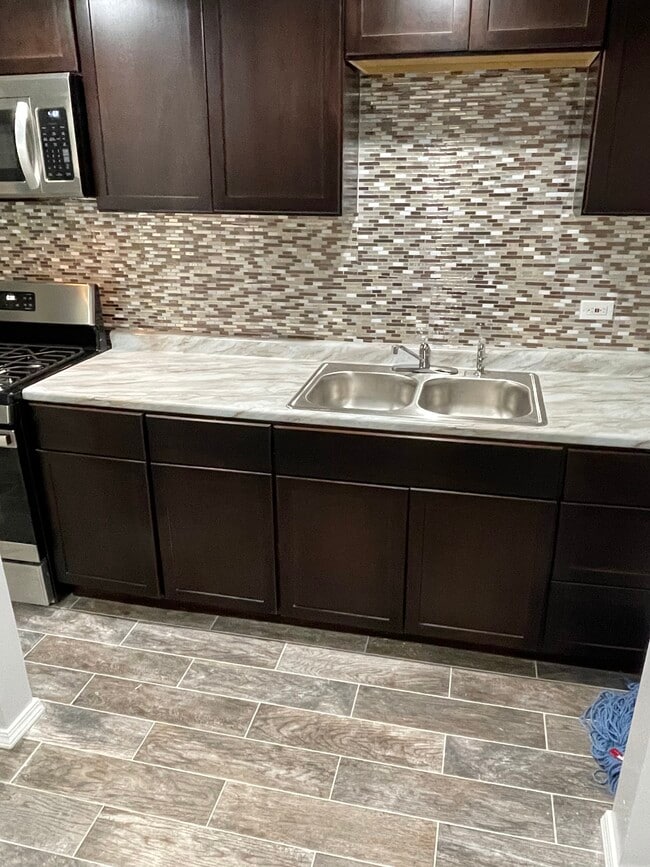 Kitche - 1518 E 72nd St