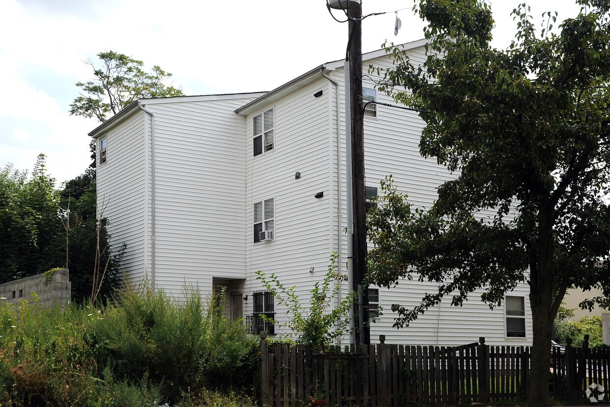 Building Photo - Littleton Avenue Community Village