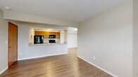 Located at 4133 Parkview Lake Dr. in Columbus, Ohio, this two-story home offers a well-organized layout spread evenly across two floors. The main level features a welcoming entrance that opens into a bright living room with warm hardwood-style flooring and a classic fireplace framed by a white mantel, complemented by a window that brings in natural light. The adjacent dining area flows seamlessly into an open-concept kitchen equipped with warm-toned wood cabinetry, granite-look countertops, a breakfast bar peninsula, a double stainless steel sink, and black appliances including a refrigerator, range, and microwave. A pantry and dedicated laundry area add practical convenience, while a patio provides outdoor access. Upstairs, two carpeted bedrooms offer comfortable retreats, including a generously sized primary bedroom. Multiple closets throughout provide ample storage. The full bathroom features tile flooring, a tub-shower combination, and a vanity with granite-style countertops. Neutral tones throughout the home create a clean, cohesive aesthetic that is move-in ready.