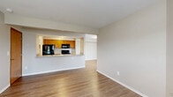 Located at 4133 Parkview Lake Dr. in Columbus, Ohio, this two-story home offers a well-organized layout spread evenly across two floors. The main level features a welcoming entrance that opens into a bright living room with warm hardwood-style flooring and a classic fireplace framed by a white mantel, complemented by a window that brings in natural light. The adjacent dining area flows seamlessly into an open-concept kitchen equipped with warm-toned wood cabinetry, granite-look countertops, a breakfast bar peninsula, a double stainless steel sink, and black appliances including a refrigerator, range, and microwave. A pantry and dedicated laundry area add practical convenience, while a patio provides outdoor access. Upstairs, two carpeted bedrooms offer comfortable retreats, including a generously sized primary bedroom. Multiple closets throughout provide ample storage. The full bathroom features tile flooring, a tub-shower combination, and a vanity with granite-style countertops. Neutral tones throughout the home create a clean, cohesive aesthetic that is move-in ready.