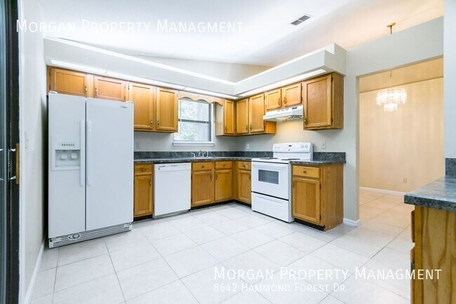Foto del edificio - 8642 Hammond Forest Dr