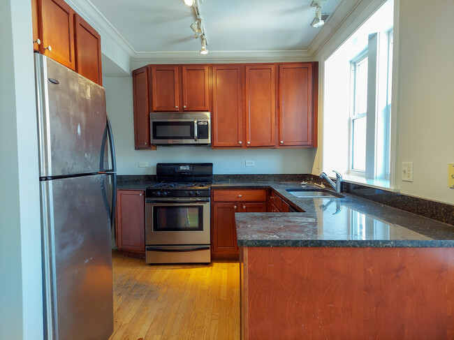 Foto del edificio - 4863 N Hermitage Ave