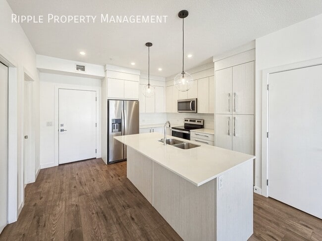 Building Photo - MODERN & SPACIOUS 2 BEDS, 2 BATHS CONDO UNIT | UNDERGROUND PARKING & PET SPA IN SAVANNA II