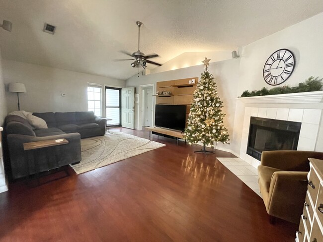 Family Room with wood burning fireplace - 1502 Tommy Ln