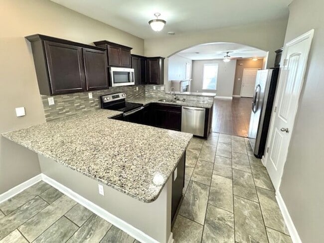 Building Photo - MOVE IN SPECIAL! Luxury, Style, Gated Comm...