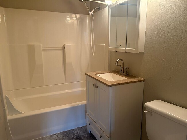 Building Photo - 2 bedroom Townhome-style living with no neighbors above or below