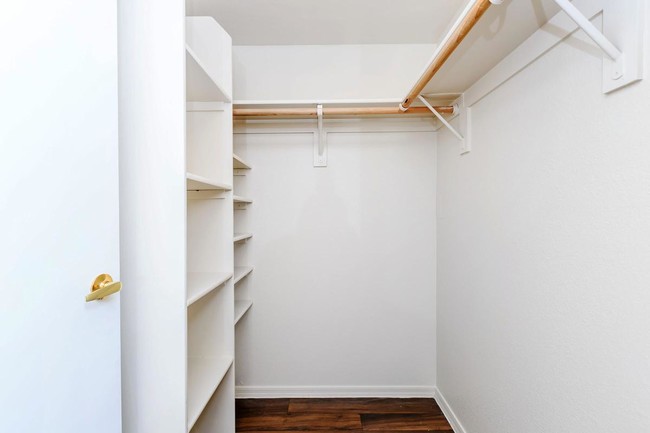 WALK-IN CLOSET WITH GENEROUS SHELVING - Siena Villas