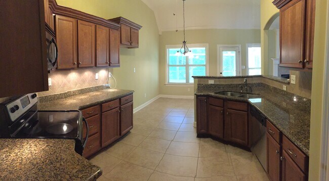 Kitchen to eating area - 340 Running Brook Ln