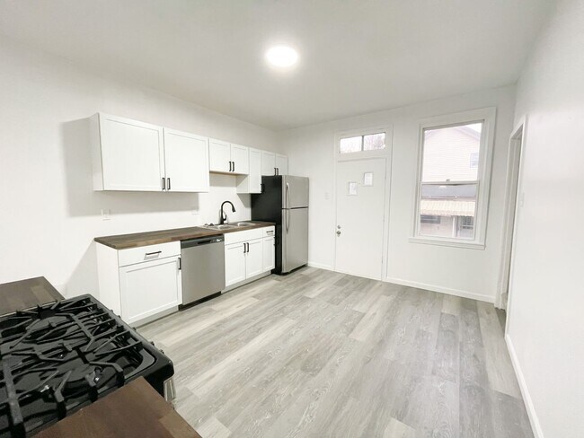 Building Photo - AVAILABLE May - Completely Renovated 2 Bed...