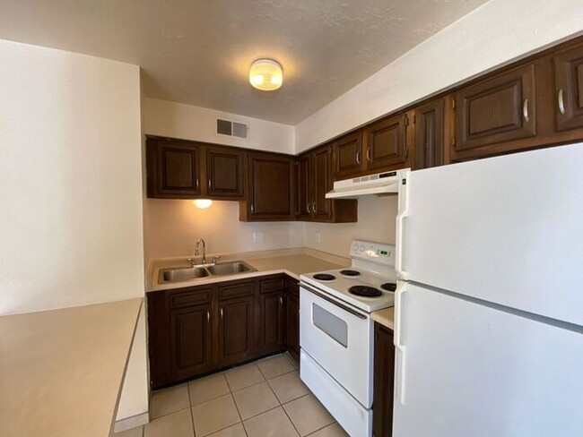 Building Photo - Utilities Included! With Security System!