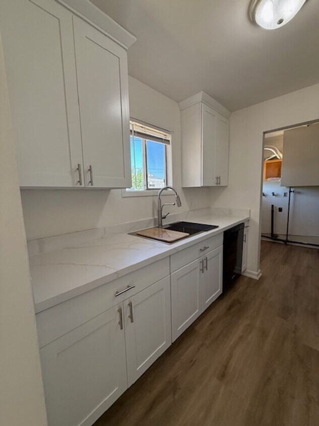 Foto principal - 3 bedroom 1 bath home with 1 car garage an...