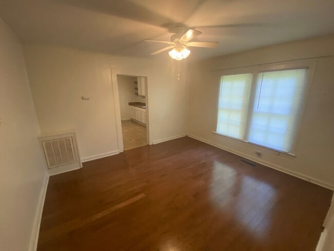 Building Photo - Big kitchen. Fenced yard. Walltown location. Under $1,300.