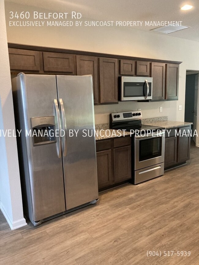 Building Photo - Free App! Save $300!! Spacious 4BR/2BA Hom...