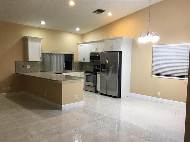 Building Photo - 9555 NW 25th Ct