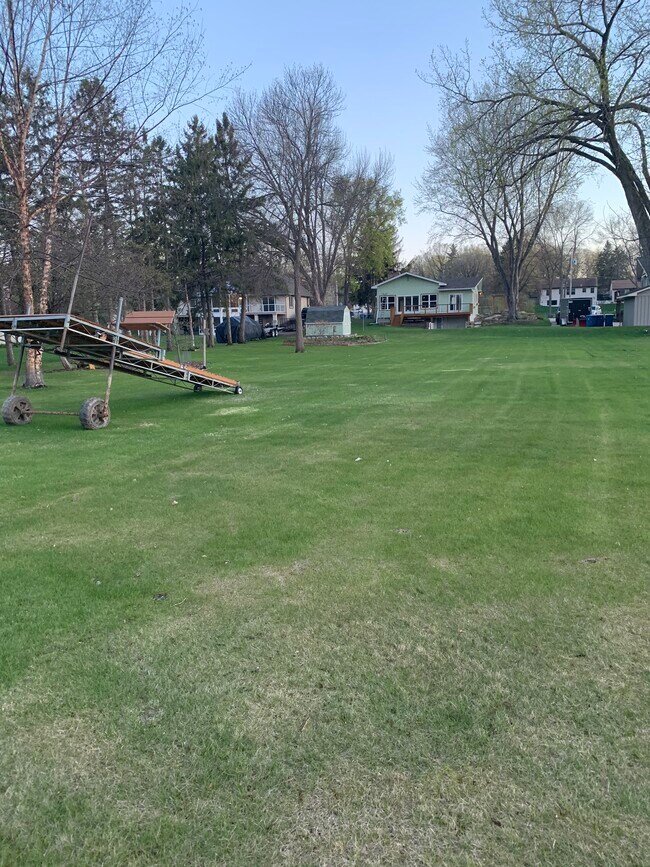 Football sized yard - standing at river bank - 505 W River Pkwy