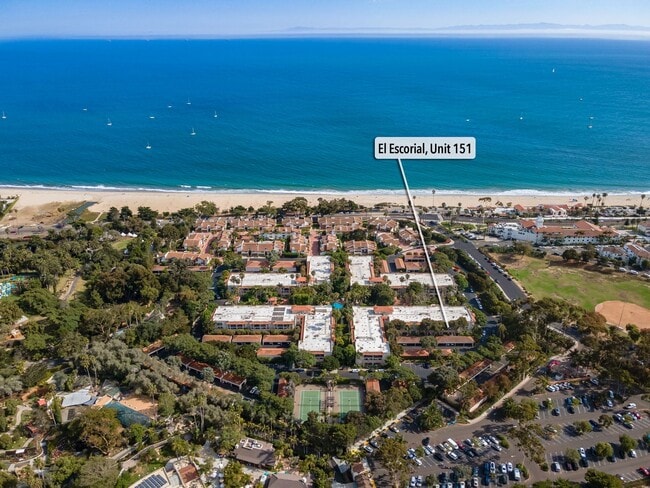 Building Photo - Fully Furnished 1BR/1BA – Top-Floor El Escorial Villa at East Beach