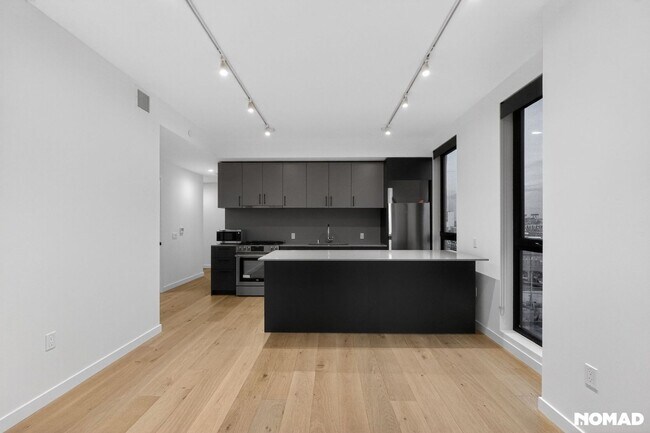 Building Photo - Act Fast: Luxury SoMa Corner Unit w/ EV Parking & Views