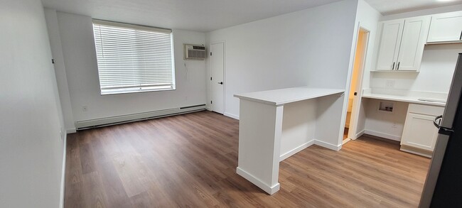 Living Area-studio - Skyview Terrace (now offering in-unit wash...