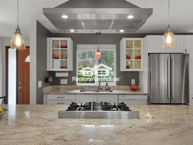 Building Photo - 3 Bed | 3 Bath: Spacious Living, Lush Gardens, and Top Schools (New Price)!