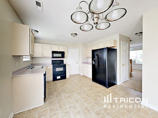 Building Photo - 10313 Cannarti Dr