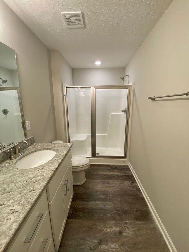 Photo - Like New Luxury Townhome! 3 BR, 2.5 BA, 1 Car Garage, Pool, Dog Park, and More!