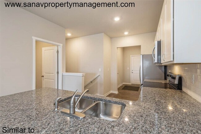 Foto del edificio - Modern Charm: 2-Bedroom, 2-Bathroom Home with Open Floor Plan and Rear Load Garage