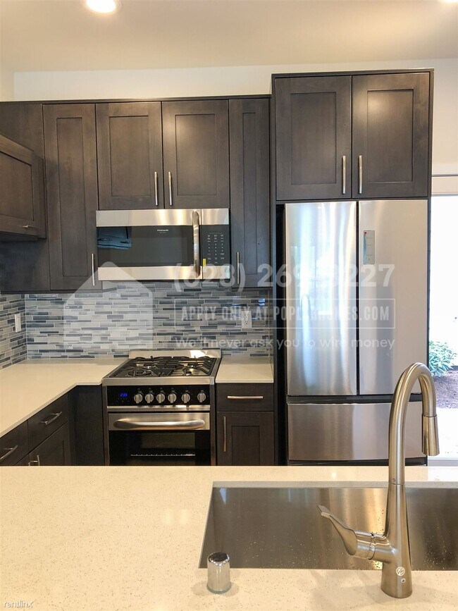 Building Photo - 3 br, 2.5 bath Townhome - 8529 Interlake A...