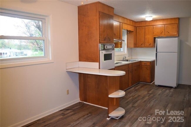 Building Photo - Home for Rent – Charming Mid-Century Brick...