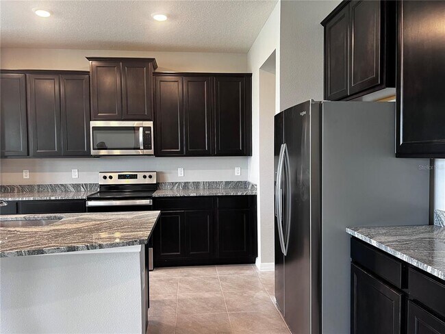 Foto del edificio - 13154 Brookside Moss Dr