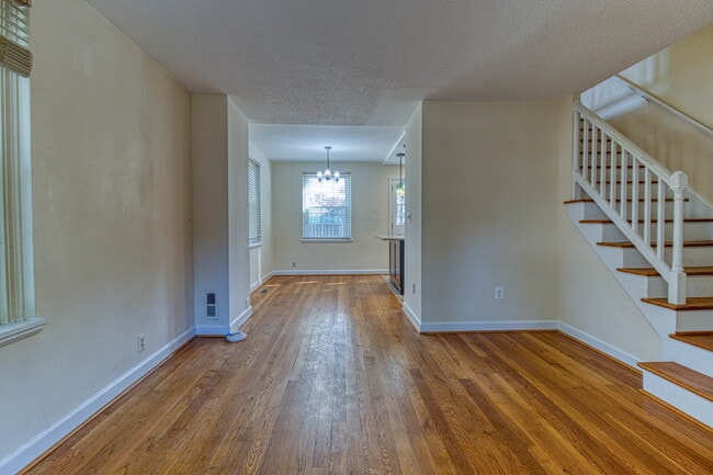 Building Photo - Discover Exceptional Townhouse Living!